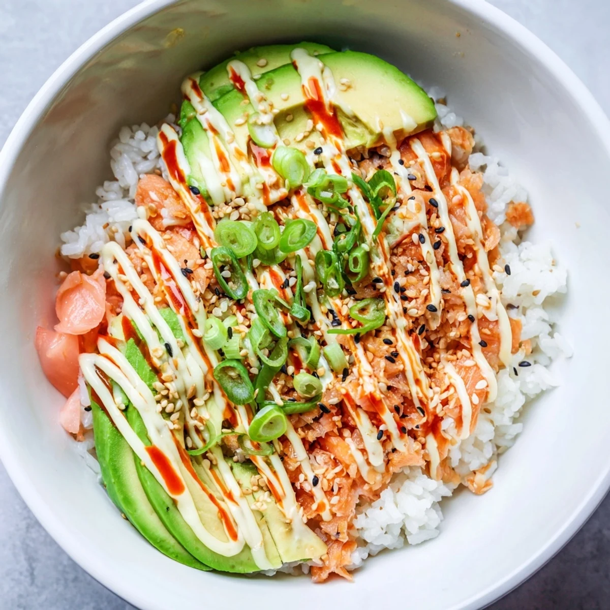 Vibrant Classic Salmon Rice bowl, featuring creamy avocado and savory toppings, ready to enjoy.