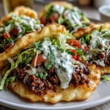 Tender seasoned beef nestled in light, airy cloud bread taco shells.