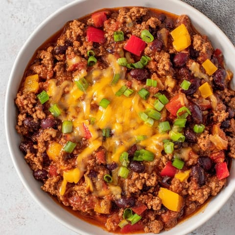 Fragrant Simple Weeknight Chili, rich with ground beef and spices, perfect for a cozy dinner.