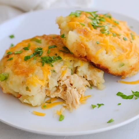 Tender shredded chicken and creamy potato come together in these delightful, golden Potato and Chicken Cakes.
